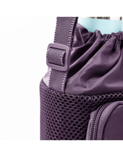 Close-up of adjustable crossbody strap on blackberry Travelon Pi Gogo Insulated Water Bottle Tote.