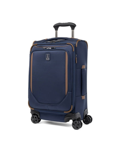 Travelpro Crew™ Classic Carry-on Expandable Spinner in Patriot Blue, front and partial left-side view.