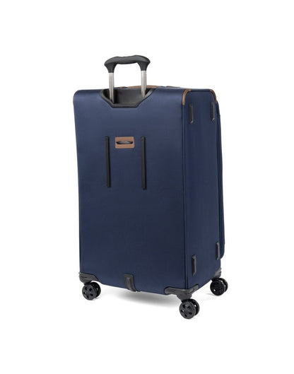 Travelpro Crew™ Classic Large Check-in Expandable Spinner in Patriot Blue, back view.