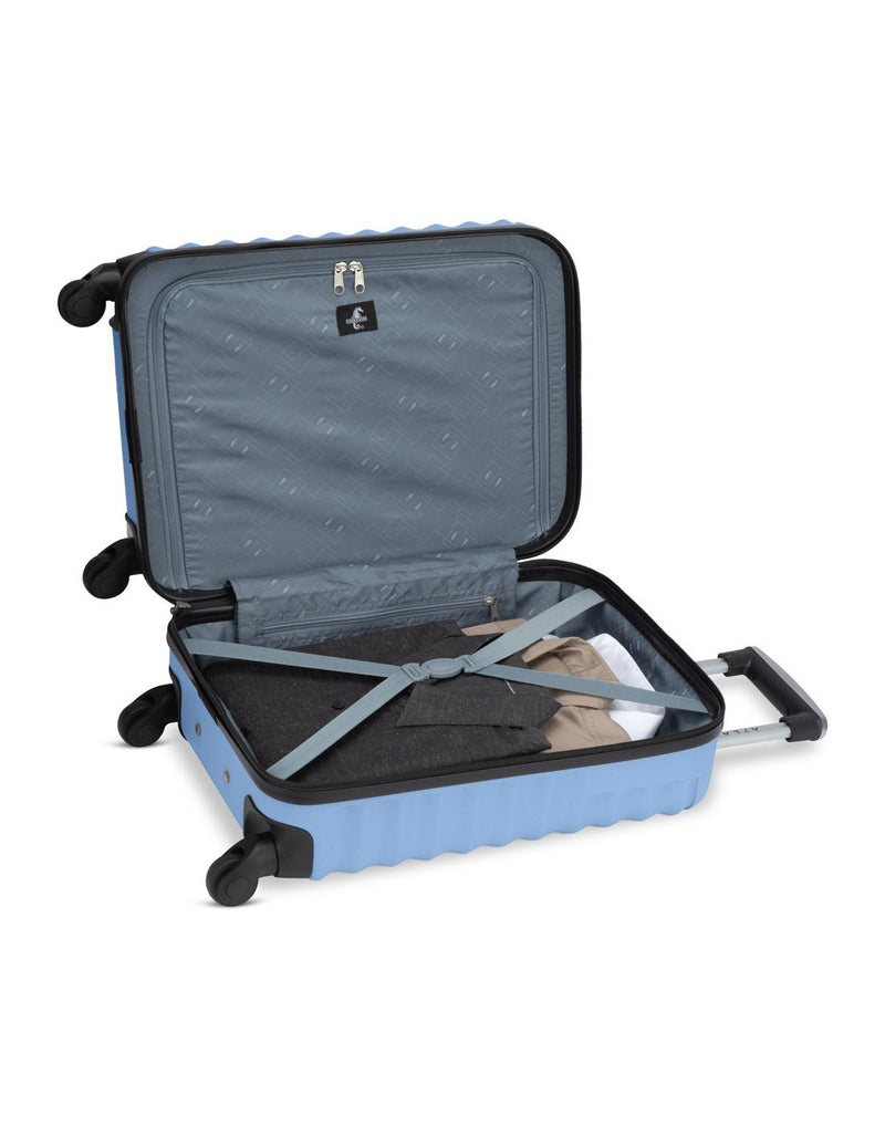 Atlantic Chaser Hardside 19" Spinner Carry-on in powder blue colour, inside view with clothes packed inside