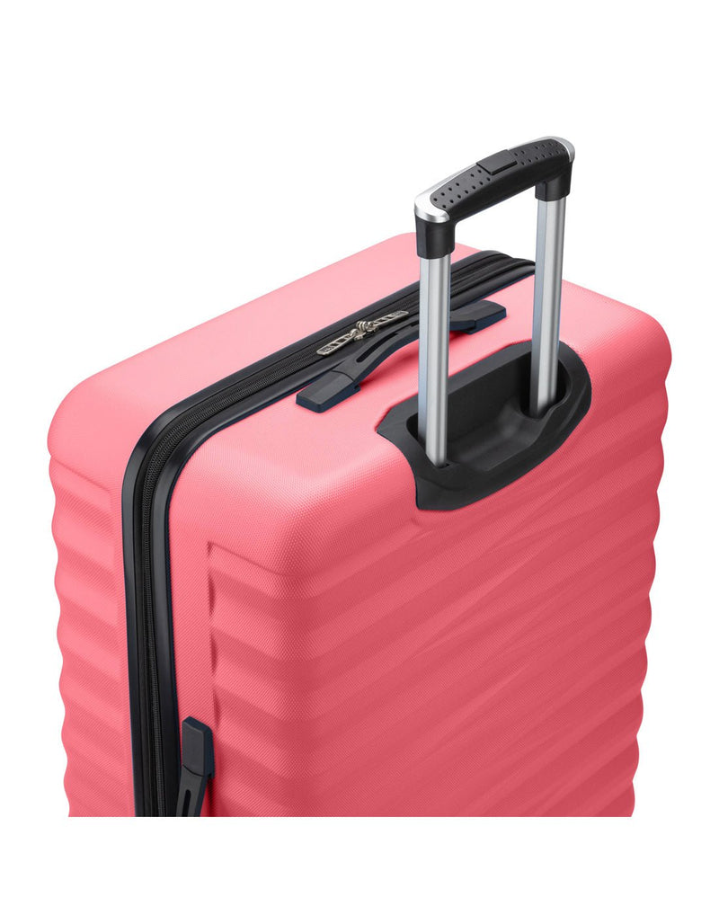 Atlantic Chaser Hardside 28" Expandable Spinner in spiced coral, pink colour, top back angled view with black and silver telescopic handle extended