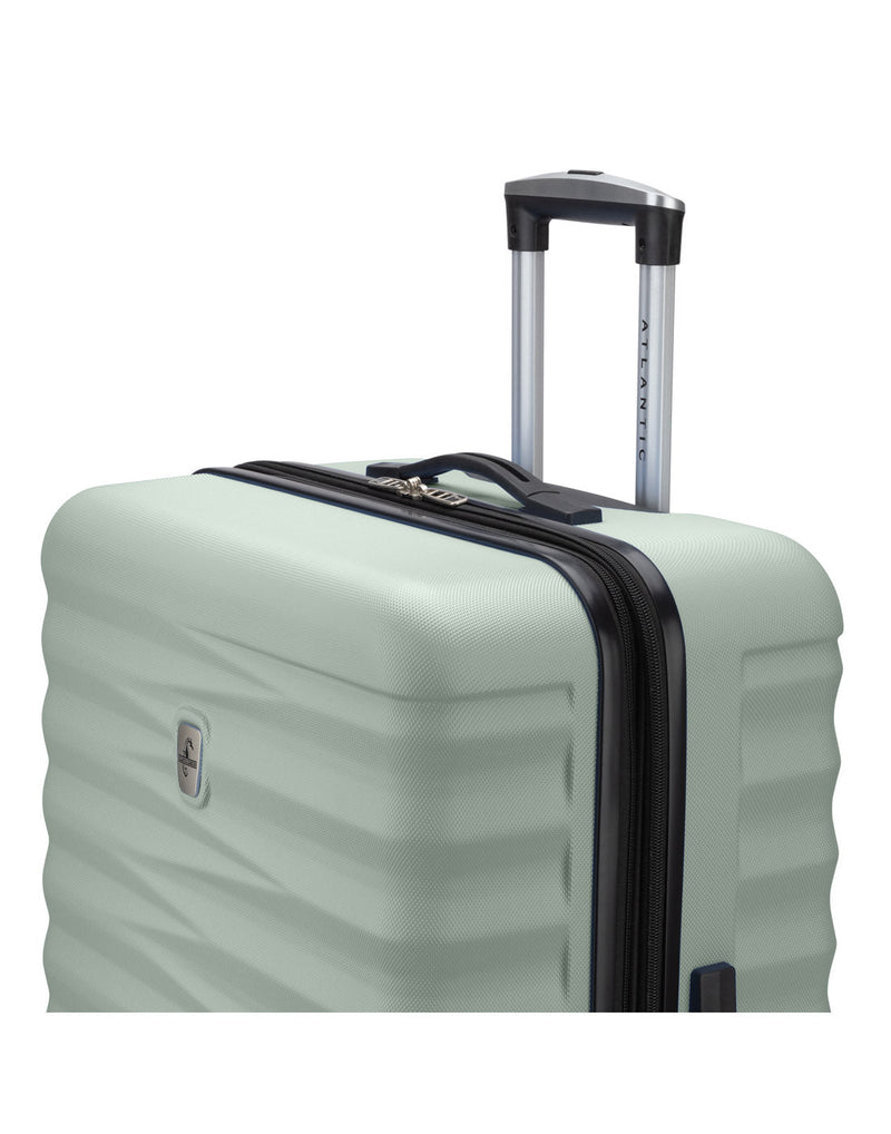 Atlantic Chaser Hardside 28" Expandable Spinner in seagrass, pale green colour, top front view with black and silver telescopic handle extended