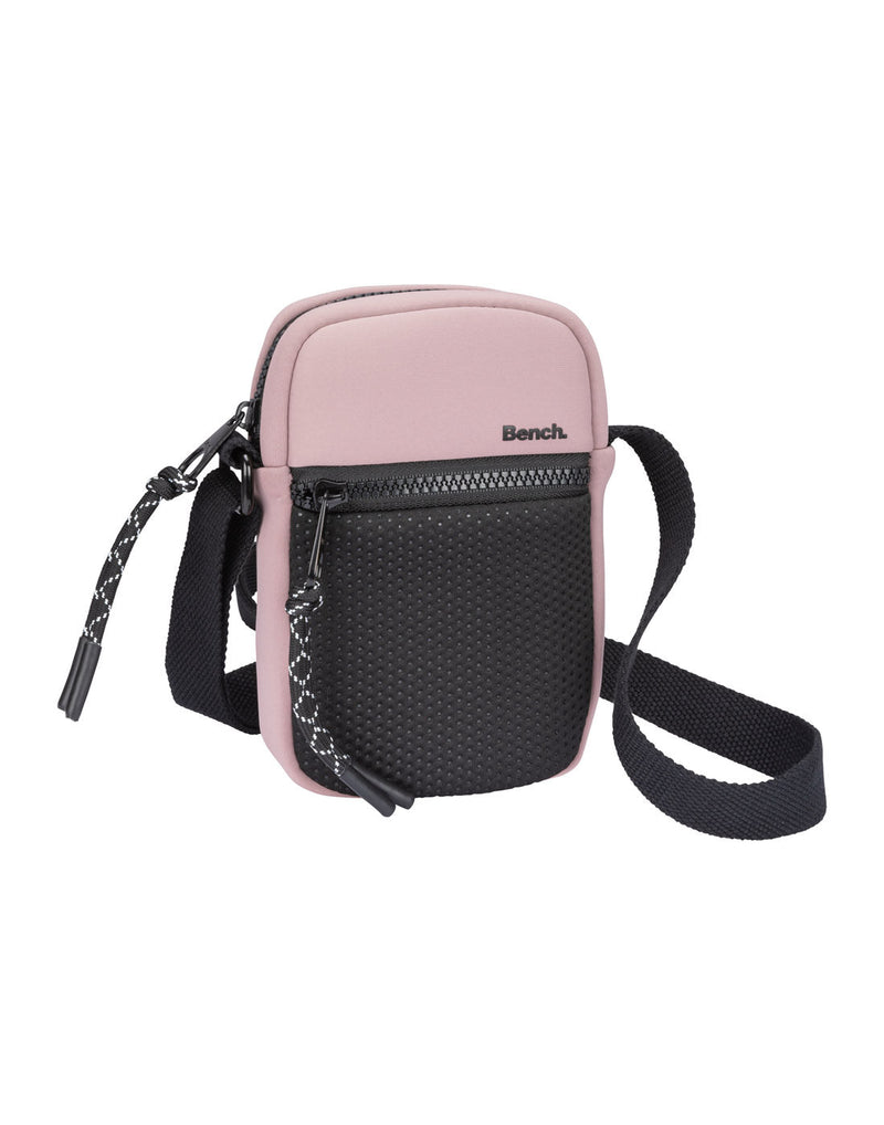 Bench Aria Cell Phone Crossbody in pink with black front mesh zippered pocket and black strap and zippers
