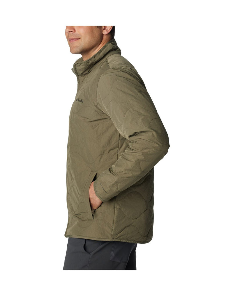 Left side view of a man wearing the Columbia Men's Birchwood™ Jacket in Stone Green colour.
