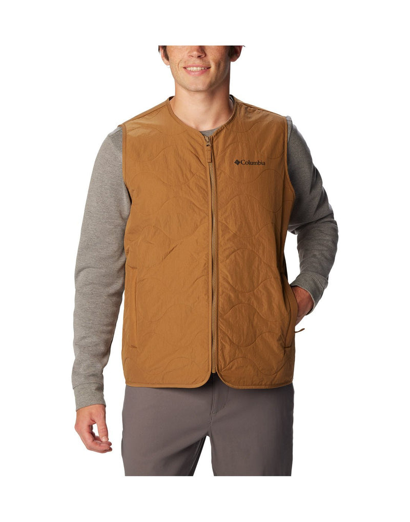 Front view of a man wearing the Columbia Men's Birchwood™ Vest in Delta brown colour.