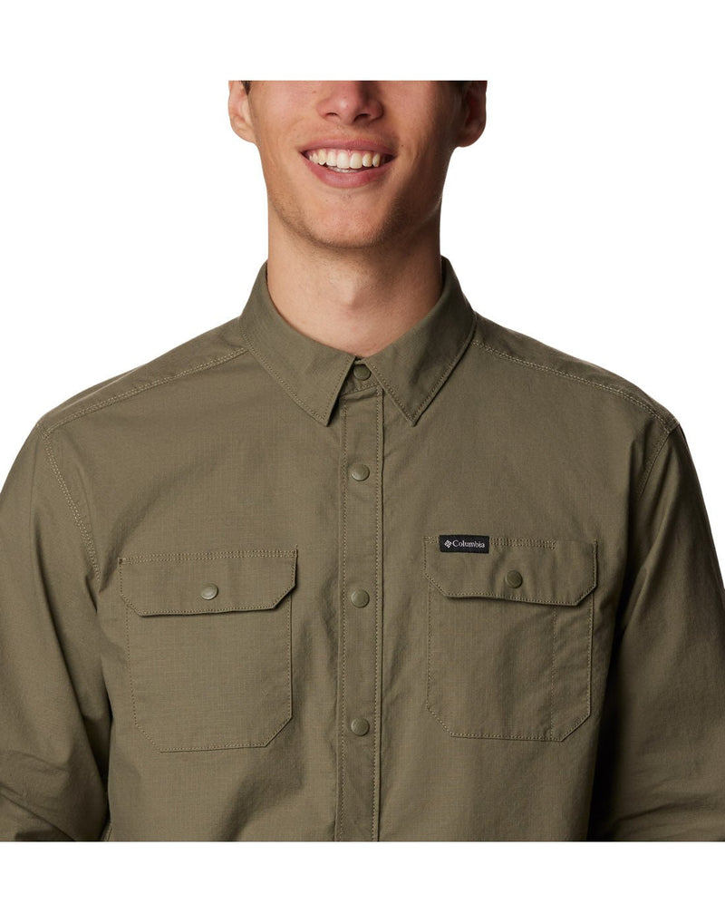 Close-up front view of a man wearing the Columbia Men's Landroamer™ Lined Shirt in Stone Green colour.