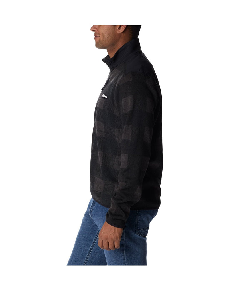 Left side view of a man wearing a Columbia Men's Sweater Weather™ II Printed Fleece Half Zip Pullover in Black Buffalo Check Print.