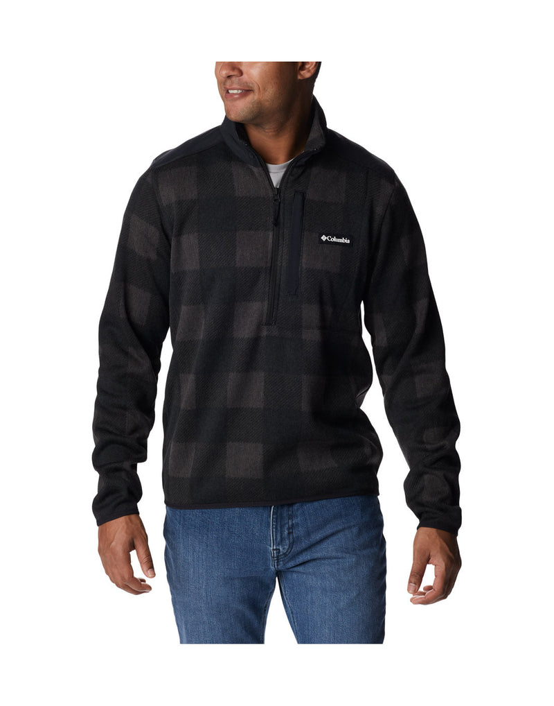Front view of a man wearing a Columbia Men's Sweater Weather™ II Printed Fleece Half Zip Pullover in Black Buffalo Check Print.