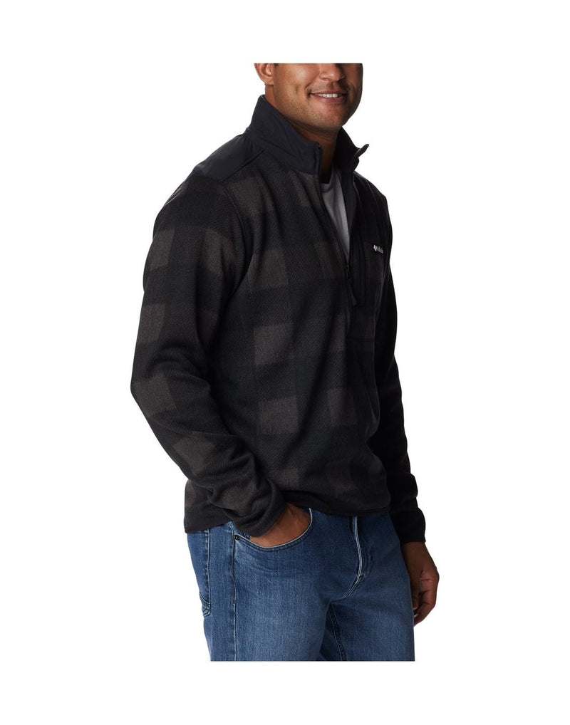 Right side view of a man wearing a Columbia Men's Sweater Weather™ II Printed Fleece Half Zip Pullover in Black Buffalo Check Print.