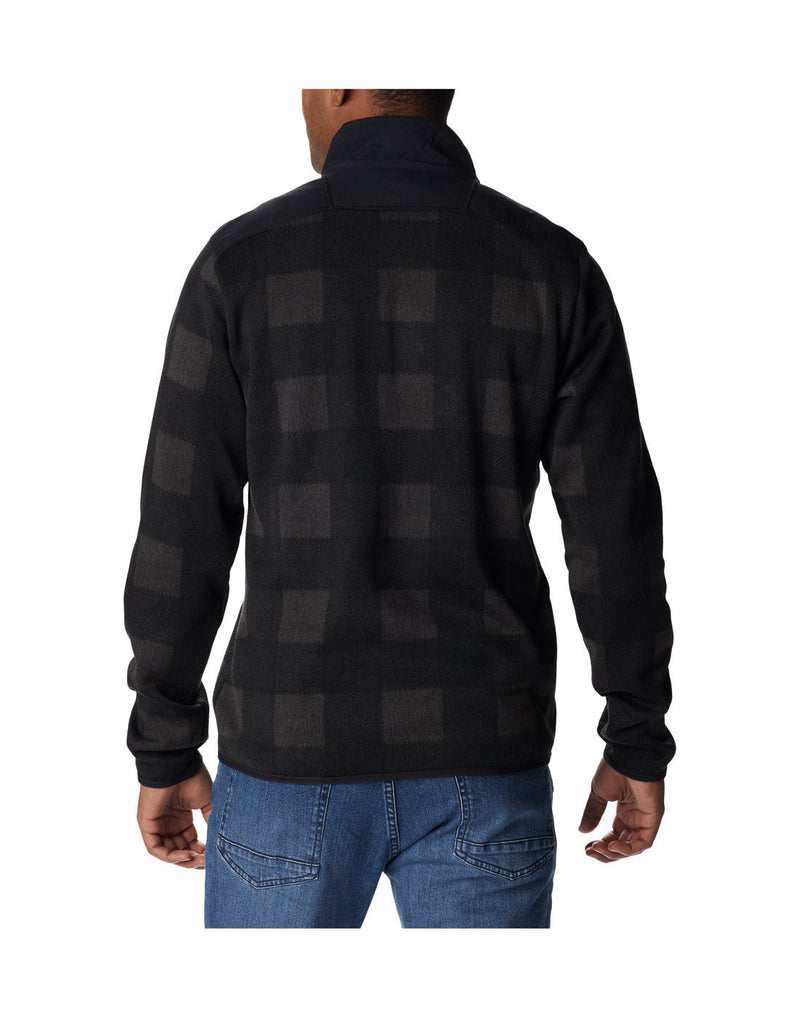 Back view of a man wearing a Columbia Men's Sweater Weather™ II Printed Fleece Half Zip Pullover in Black Buffalo Check Print.