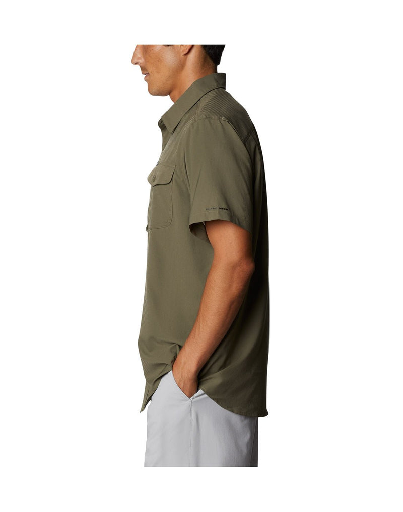 Left side view of a man wearing a Columbia Men's Utilizer™ II Solid Short Sleeve Shirt in stone green colour.