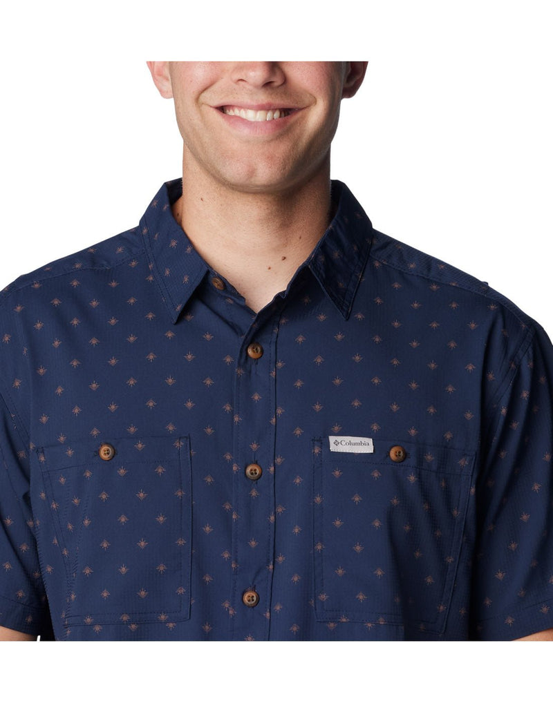 Close up of man wearing Columbia Men's Utilizer™ Printed Woven Short Sleeve Shirt in collegiate navy dawn dot pattern, front view
