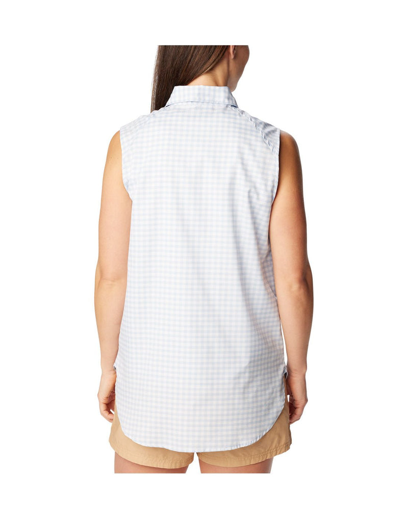 Woman wearing beige shorts and Columbia Women's Anytime™ Lite Sleeveless Top in whisper light blue and white checkered pattern, back view