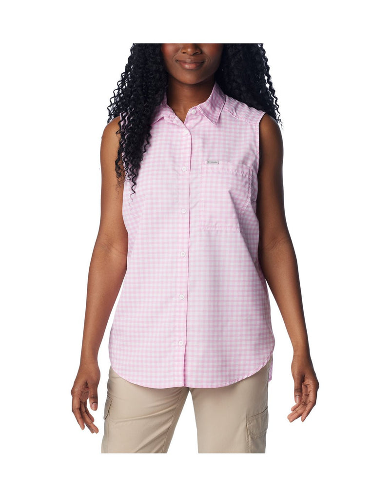 Woman wearing beige pants and Columbia Women's Anytime™ Lite Sleeveless Top in cosmos light pink and white checkered pattern, front view