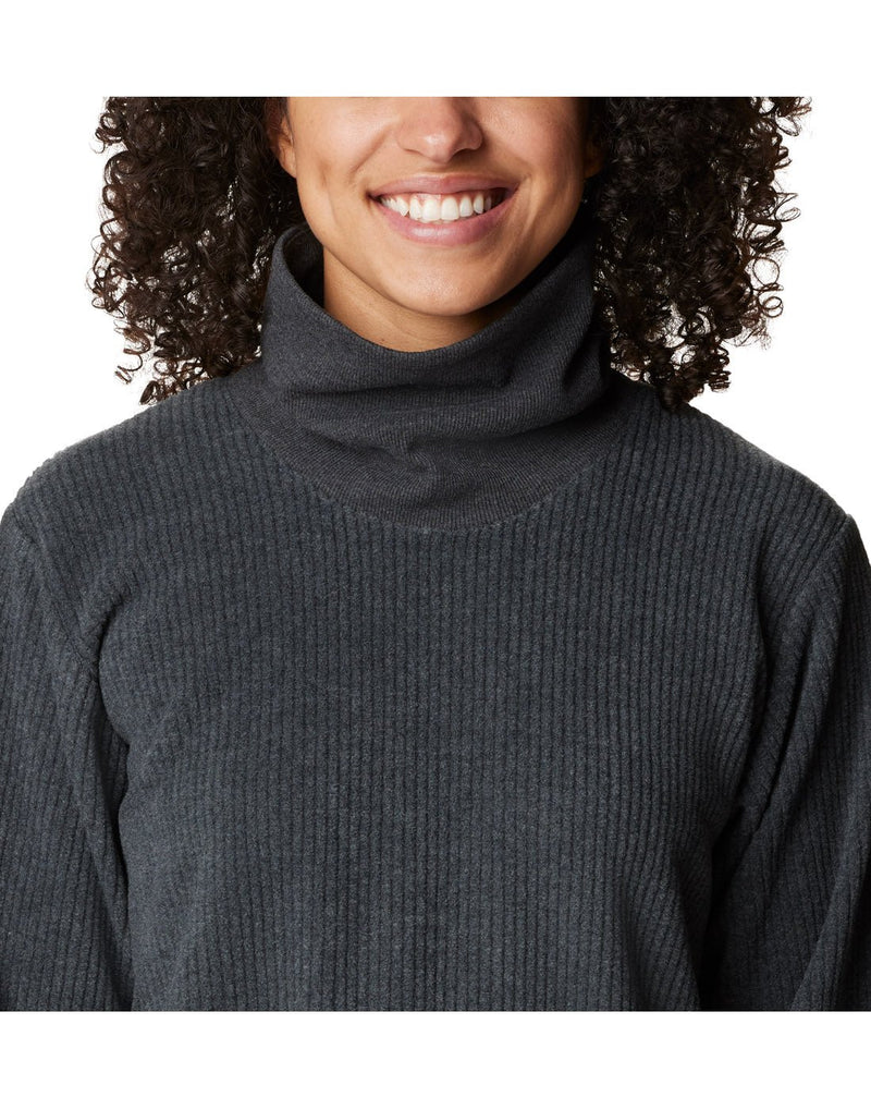 Close-up front view of a woman wearing a Columbia Women's Boundless Trek™ Fleece Dress in black.
