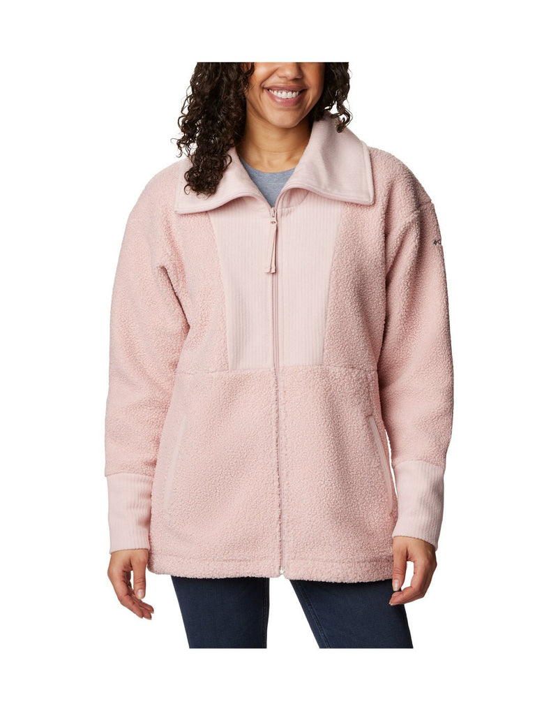 Front view of a woman wearing the Columbia Women's Boundless Trek™ Fleece Full Zip Jacket in Dusty Pink.