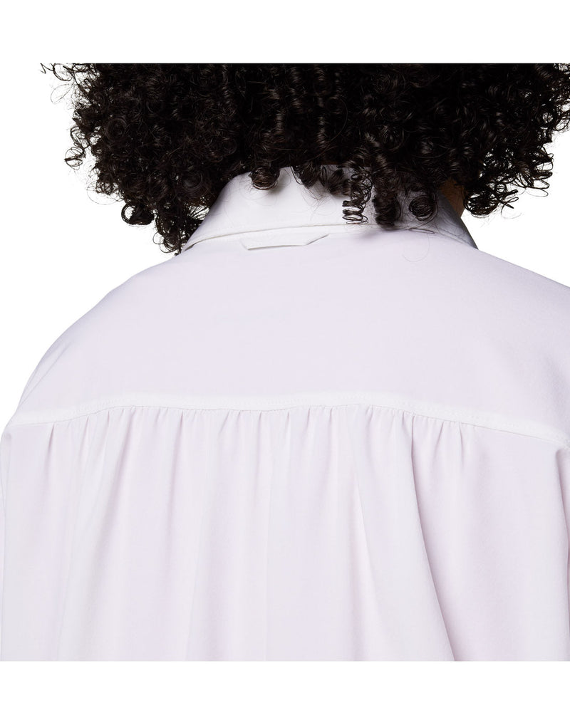 Close up of woman wearing Columbia Women's Boundless Trek™ Layering Long Sleeve Shirt in white, back view