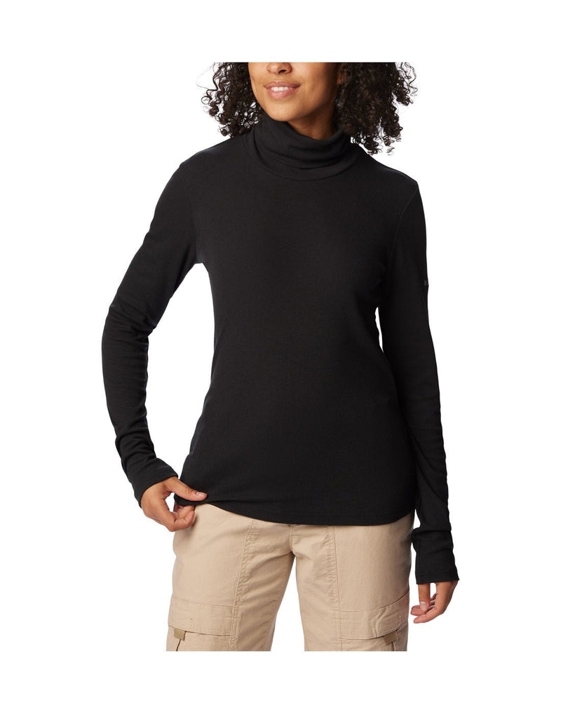 Additional front view of a woman wearing the Columbia Women's Boundless Trek™ Ribbed Turtleneck Long Sleeve Shirt in black.