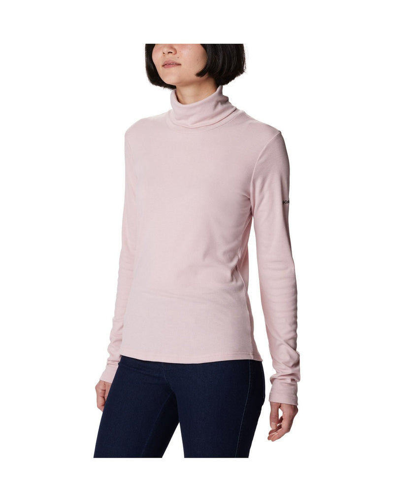 Additional front view of a woman wearing the Columbia Women's Boundless Trek™ Ribbed Turtleneck Long Sleeve Shirt in Dusty Pink.