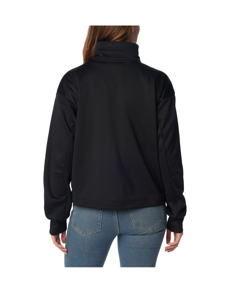 Woman wearing blue jeans and Columbia Women's Boundless Trek™ Tech Full Zip Jacket in black, back view