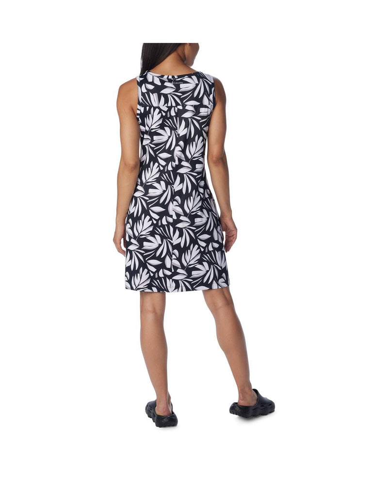 Back view of a woman wearing Columbia Women's Chill River™ Printed Dress in black areca print.