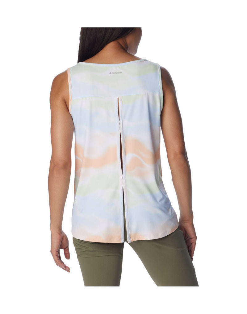 Back view of a woman wearing Columbia Women's Chill River™ Tank in White Undercurrent print. Showing the back venting.
