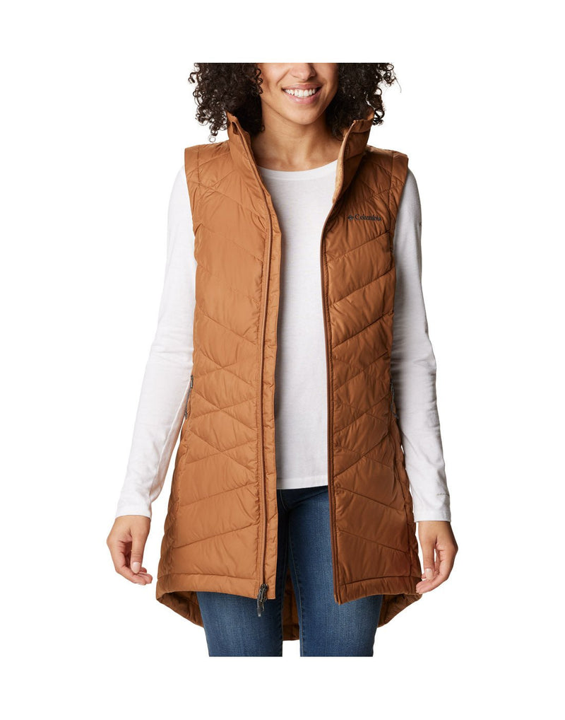 Front view of a woman wearing an unzipped Columbia Women's Heavenly™ Long Vest in Camel Brown colour.