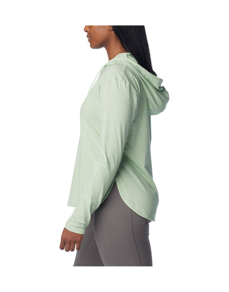 Left side view of a woman wearing Columbia Women's Sun Trek™ Hooded Pullover  in Sage Leaf Heather colour.