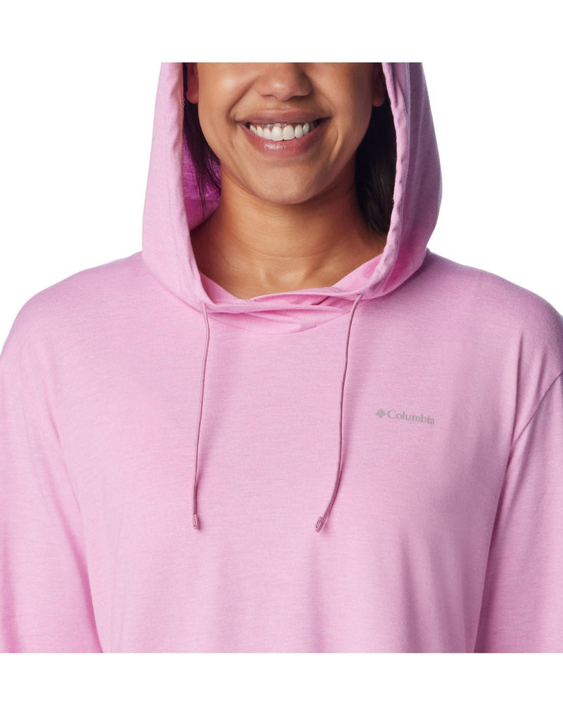 Upper torso view of a woman wearing Columbia Women's Sun Trek™ Hooded Pullover in cosmos heather colour with hood up.