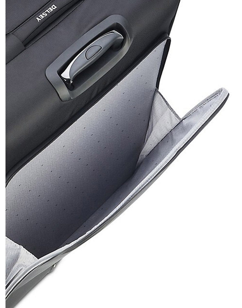 Close up of back zipper pocket, open, on black Delsey Optima luggage