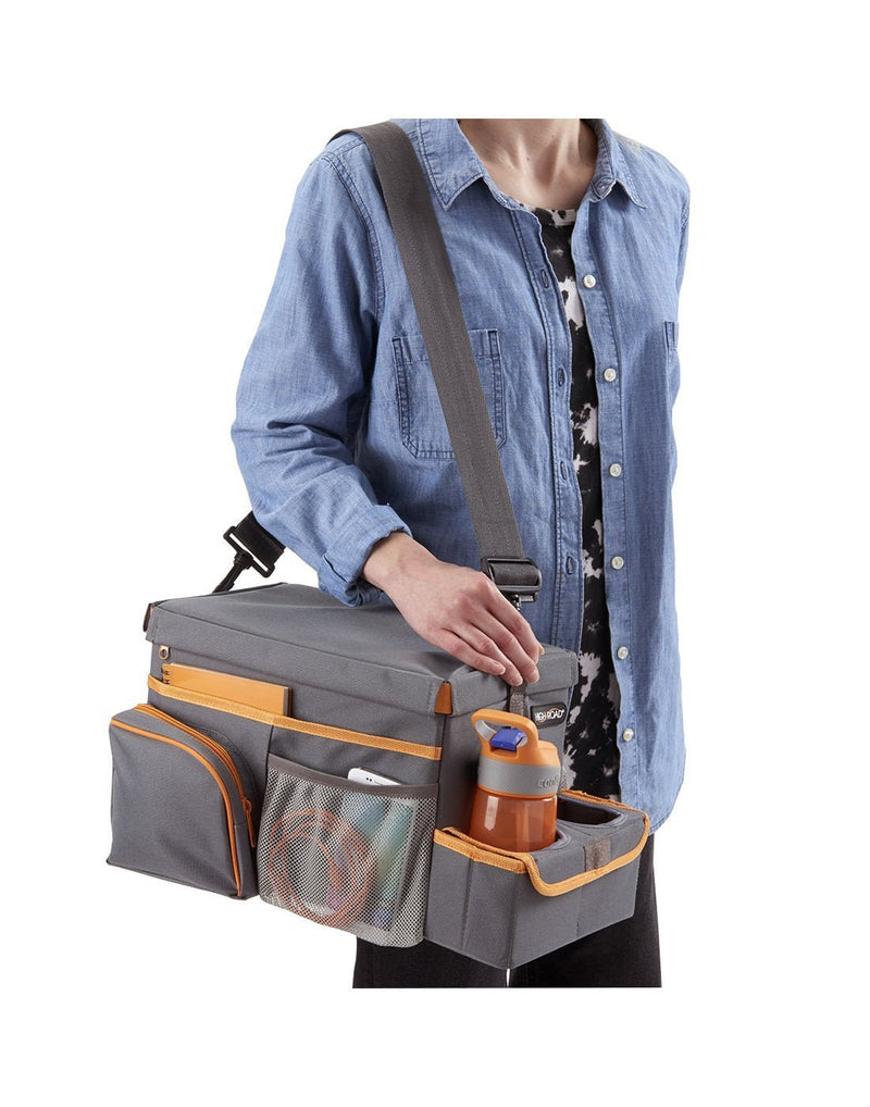 Women carrying high road carhop™ back seat organizer with insulated cooler shoulder strap view