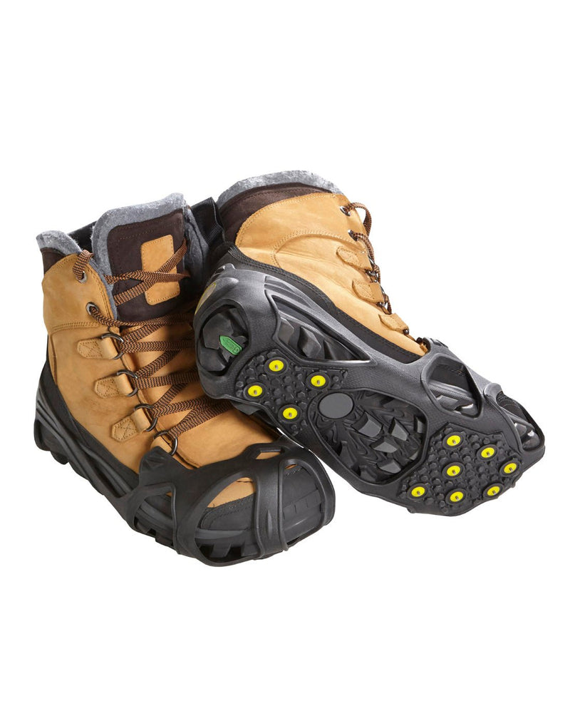 Icetrax IT11 Pro Tungsten Grip Ice Cleats on brown hiking boots
