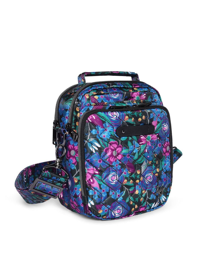 Lug Skeeter Convertible Crossbody, whimsy black with blue and purple flowers and green leaves, front angled view
