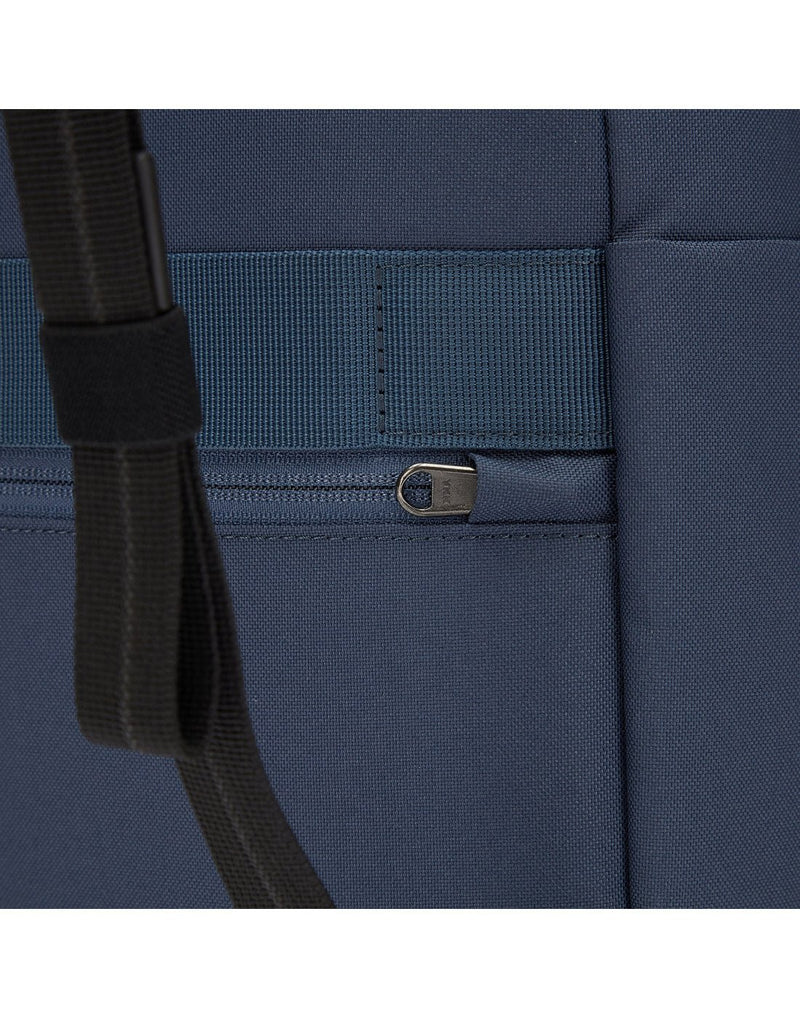 Close up of zipper pull tucked into security tab