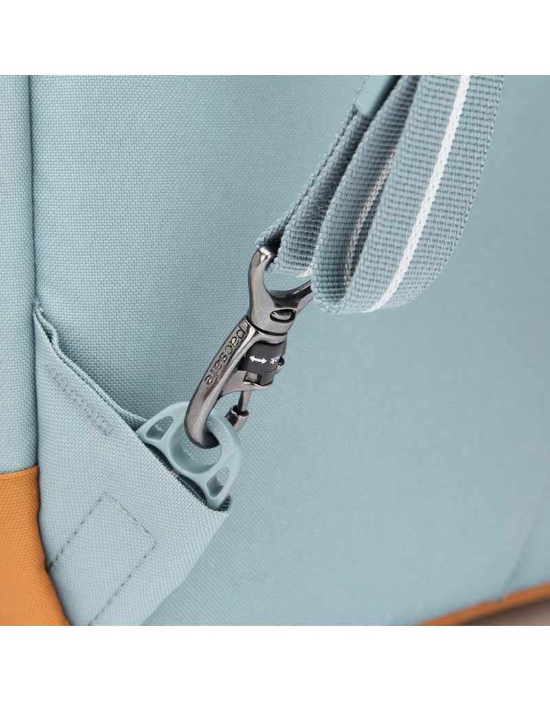 Close up of TurnNLock strap clip on fresh mint backpack