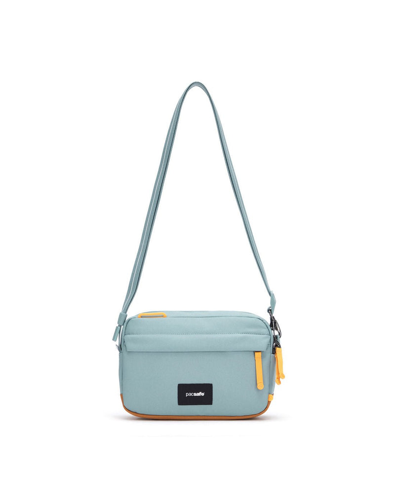 Pacsafe® GO Anti-Theft Crossbody Bag in fresh mint colour front view with Carrysafe® slashguard strap extended.