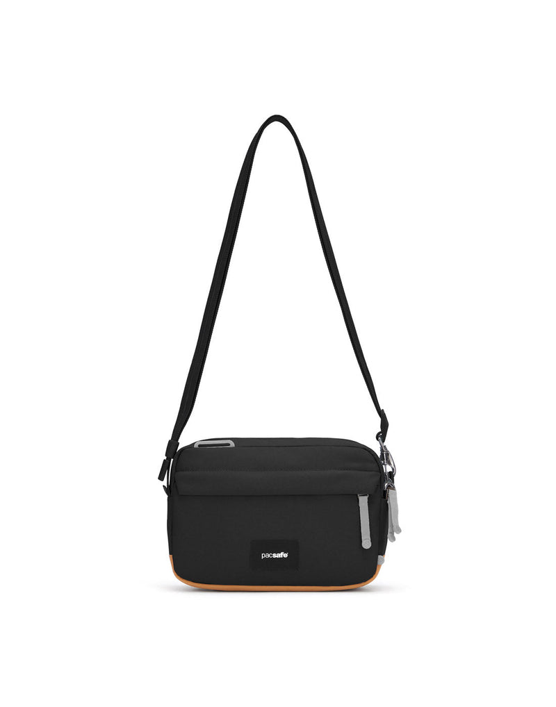 Pacsafe® GO Anti-Theft Crossbody Bag in jet black colour front view with Carrysafe® slashguard strap extended.