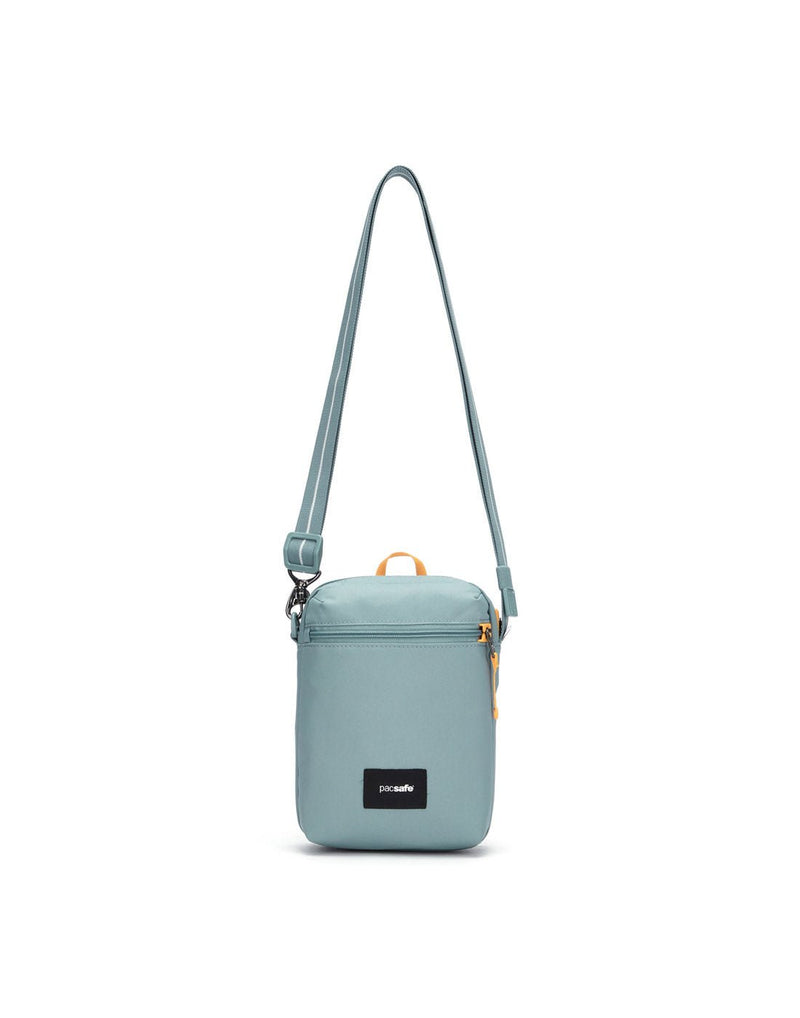 Pacsafe® GO Anti-Theft Festival Crossbody in fresh mint colour front view with cut-resistant strap extended.