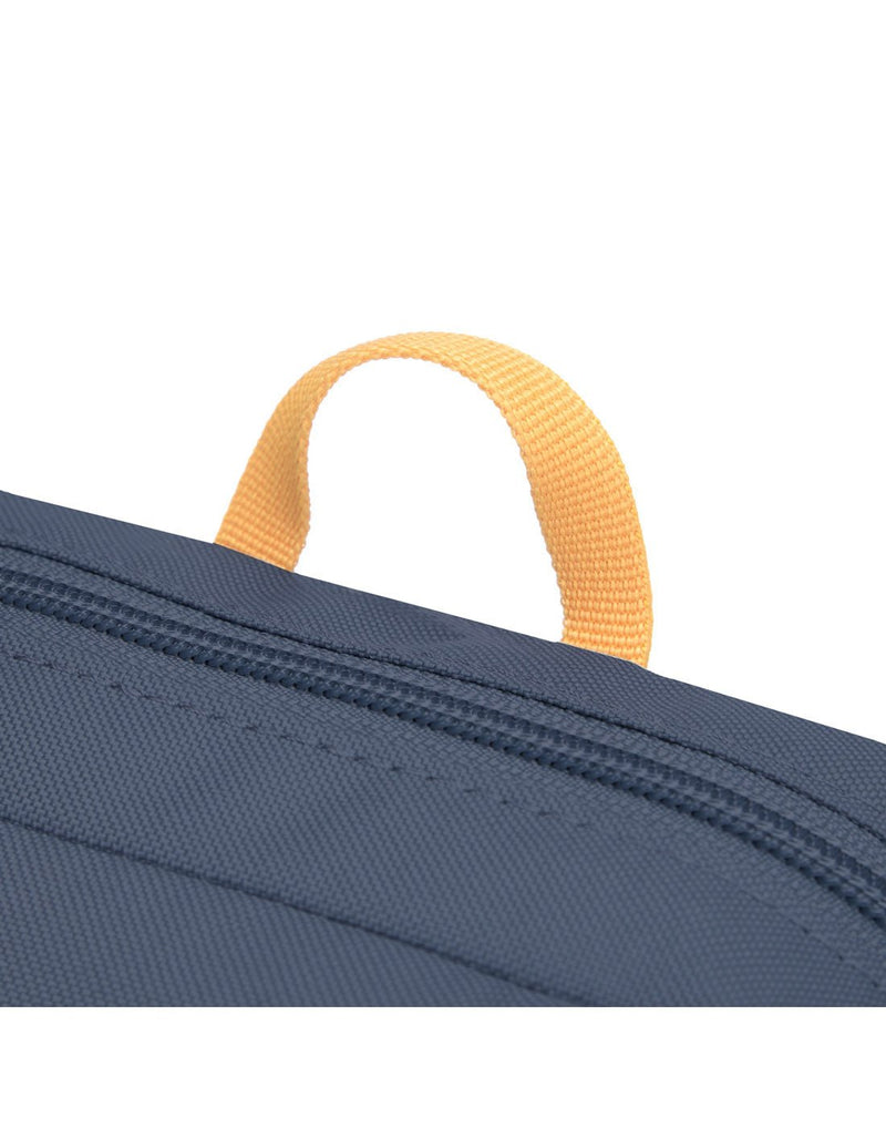Pacsafe® GO Anti-Theft Festival Crossbody in coastal blue colour, close-up of  hanging loop attached to top of the bag.