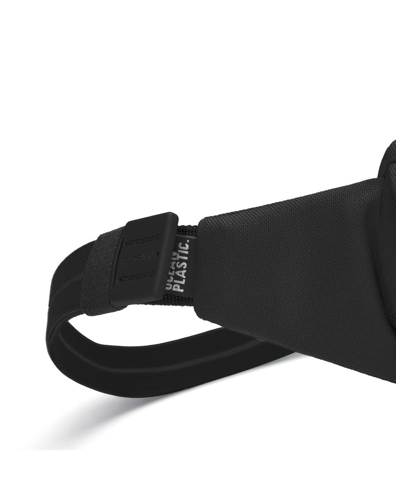 Pacsafe® GO Anti-Theft Sling Pack in jet black, close up view of the Carrysafe® slashguard strap.