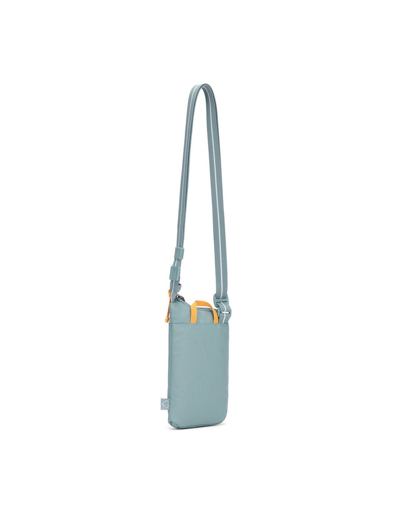 Pacsafe® GO Anti-Theft Tech Crossbody in fresh mint colour back view with Carrysafe® slashguard strap extended.