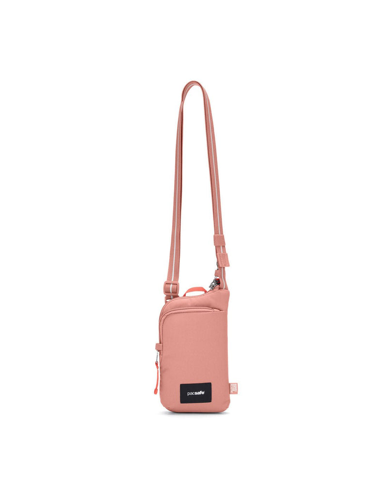 Pacsafe® GO Anti-Theft Tech Crossbody in rose colour front view with Carrysafe® slashguard strap extended.