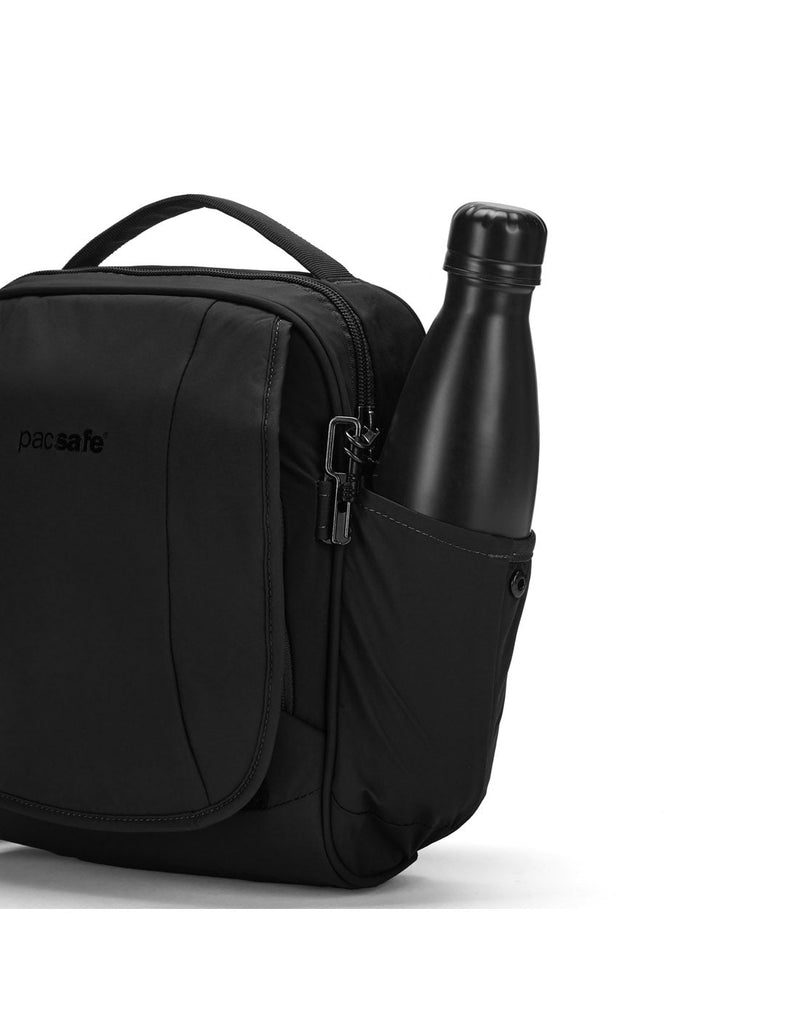 Black water bottle inside side pocket of black Pacsafe® LS200 Anti-theft Crossbody Bag
