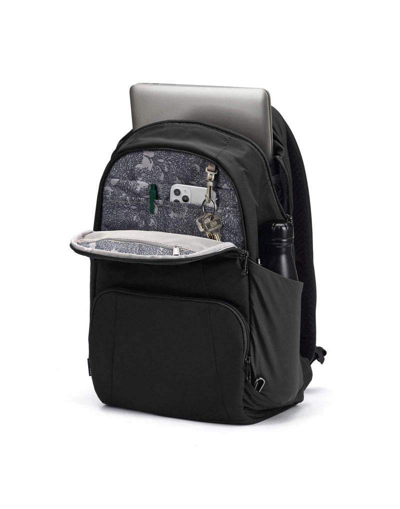 Pacsafe® LS450 Anti-Theft 25L Backpack, black, unzippered with laptop sticking out of main compartment, pen, phone and keys in front pocket and water bottle in side slip pocket