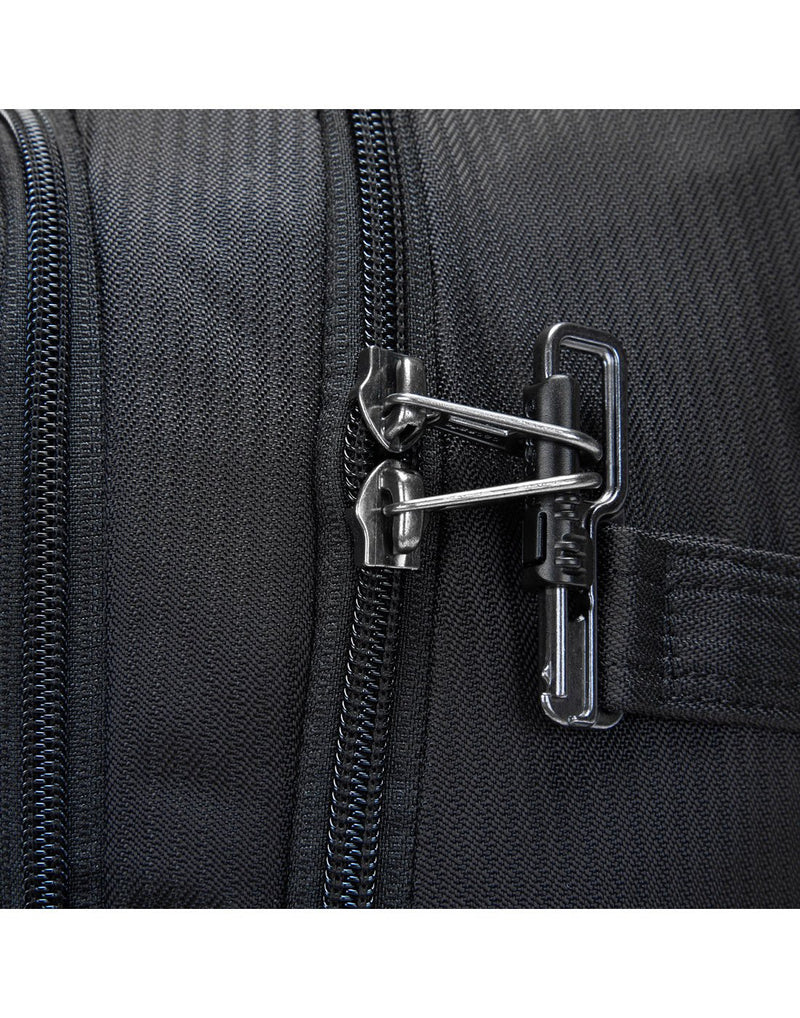Close up of zipper pulls secured to safety latch