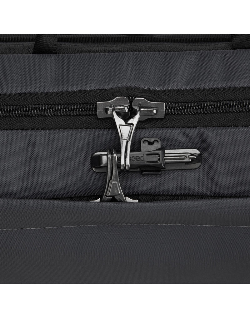 Close up of lockable zipper pulls on slate backpack