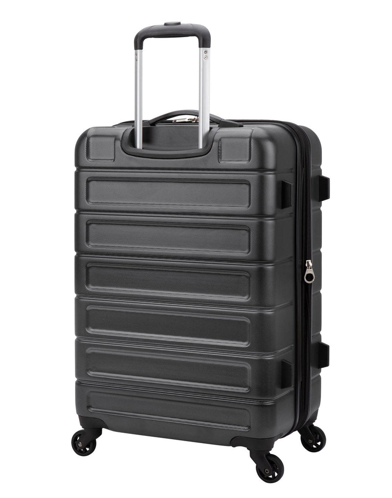 Medium size Roots Adventure luggage in charcoal, back angled view