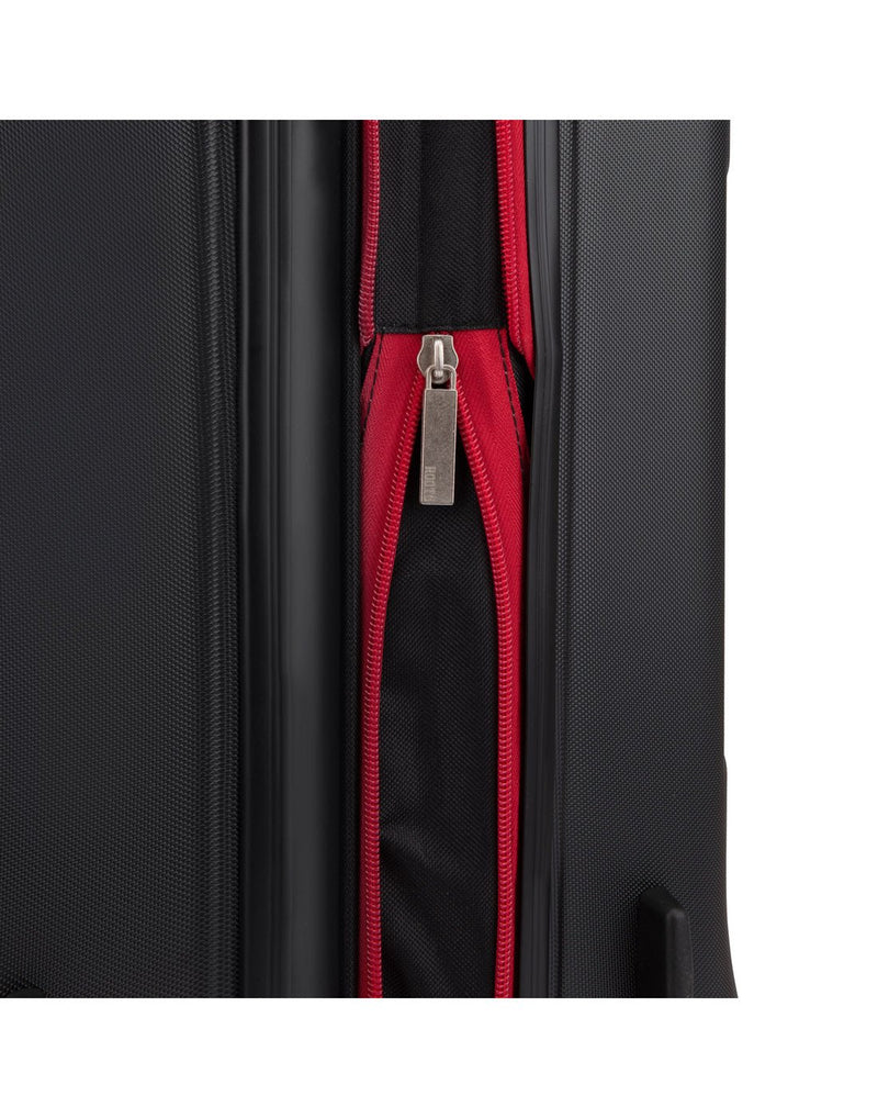 Close up of red expandable zipper