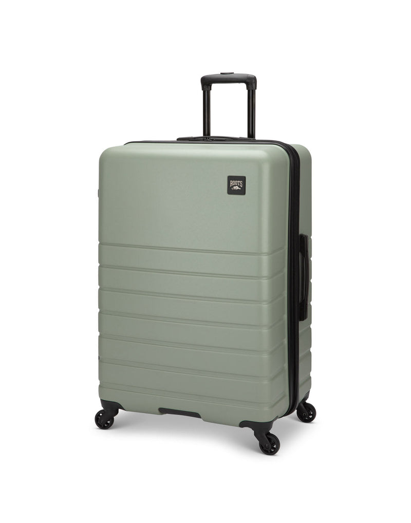 Roots Panorama 28" Hardside Expandable Spinner in seagrass, pale green colour, front angled view