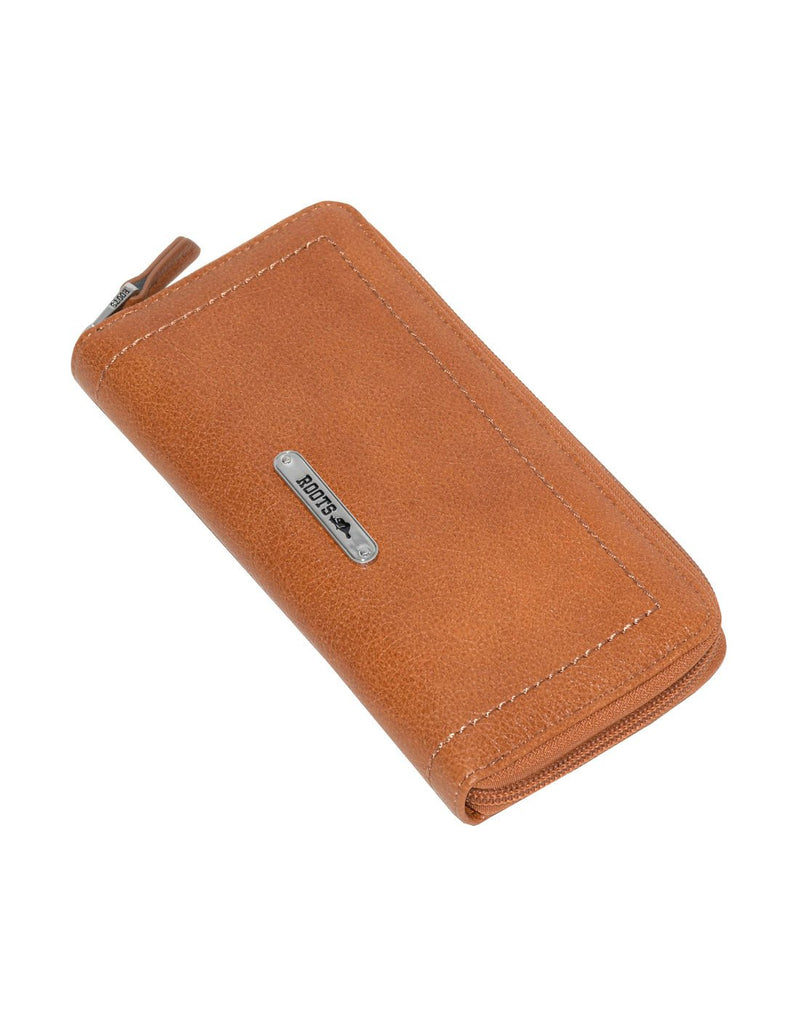 Roots Slim Zip Around Bifold Wallet in cognac colour, front view, laying down